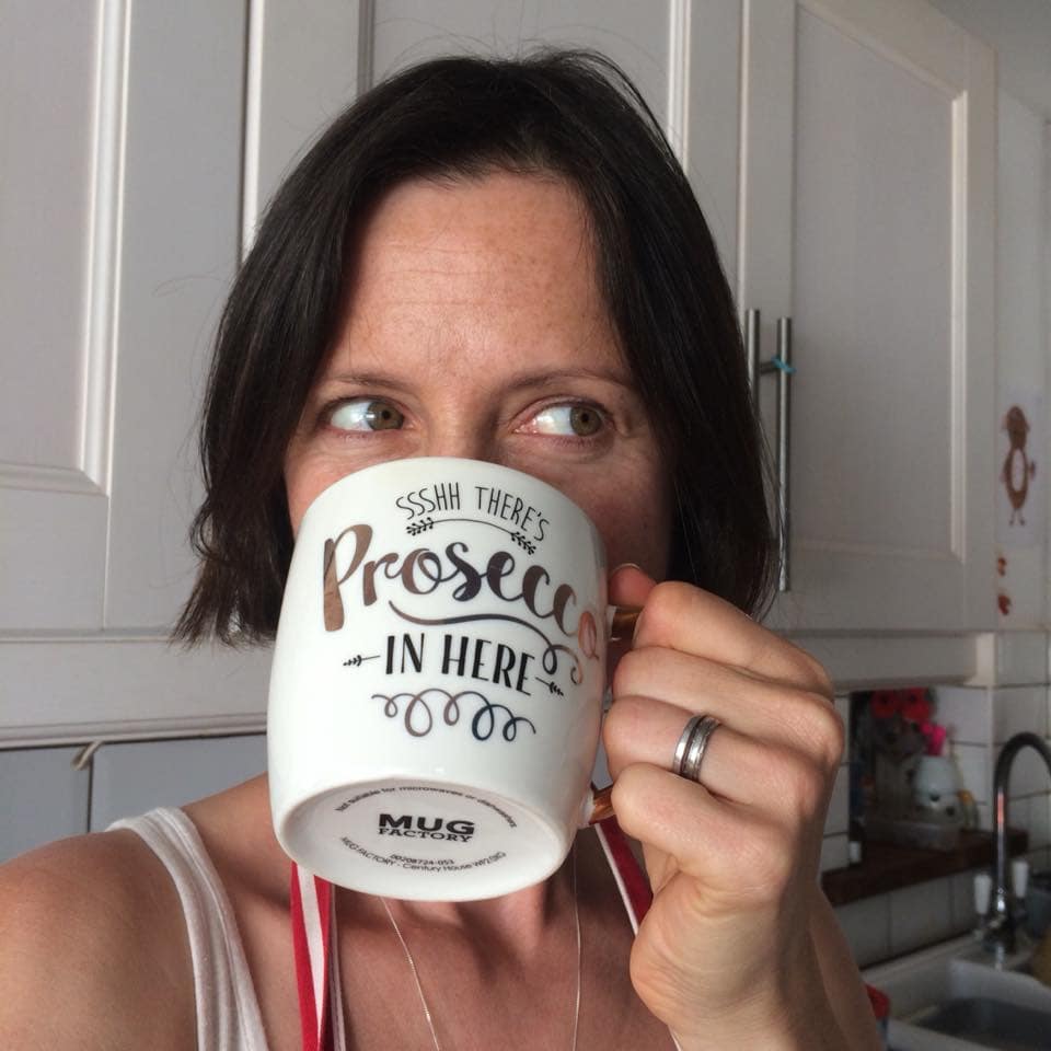 blog writer with mug of tea